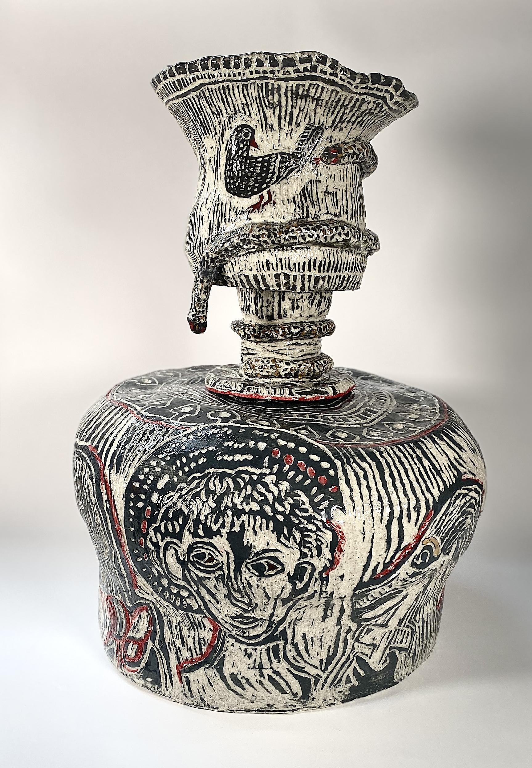 Hand built with coloured slip, underglaze, glaze lustre and sgraffito, 