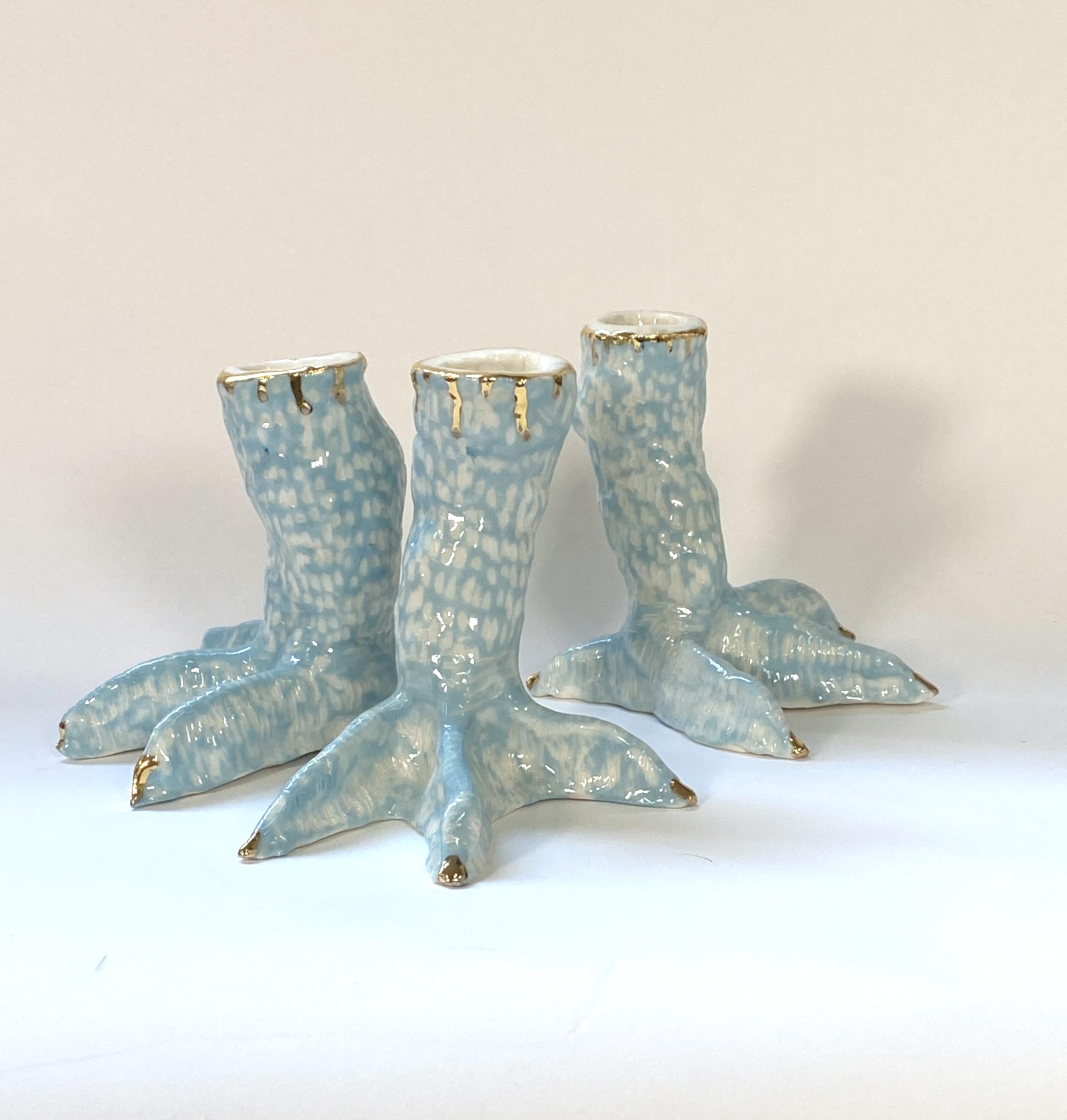 hand built with coloured slip underglaze, sgraffito and lustre sculpture