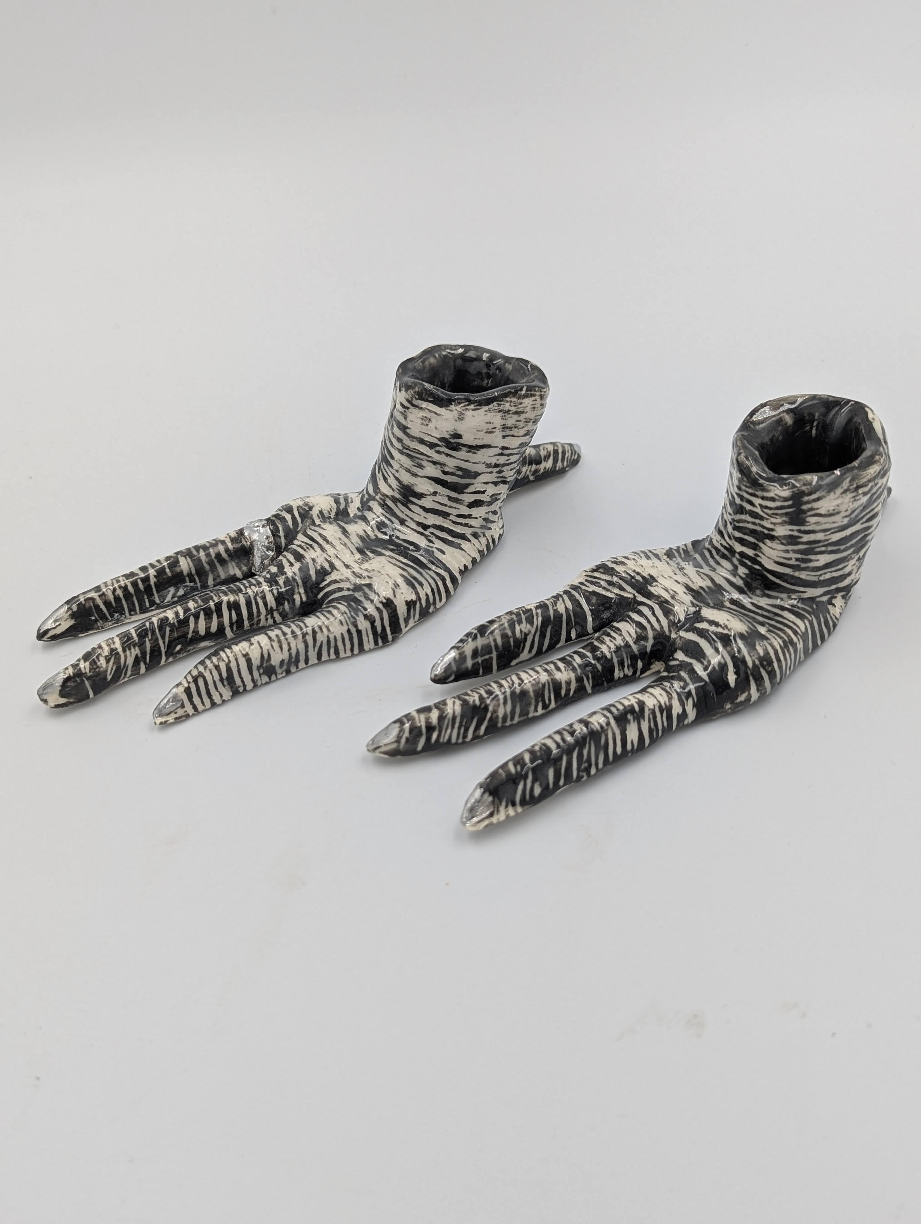 hand built with coloured slip sgraffito and cold paint.