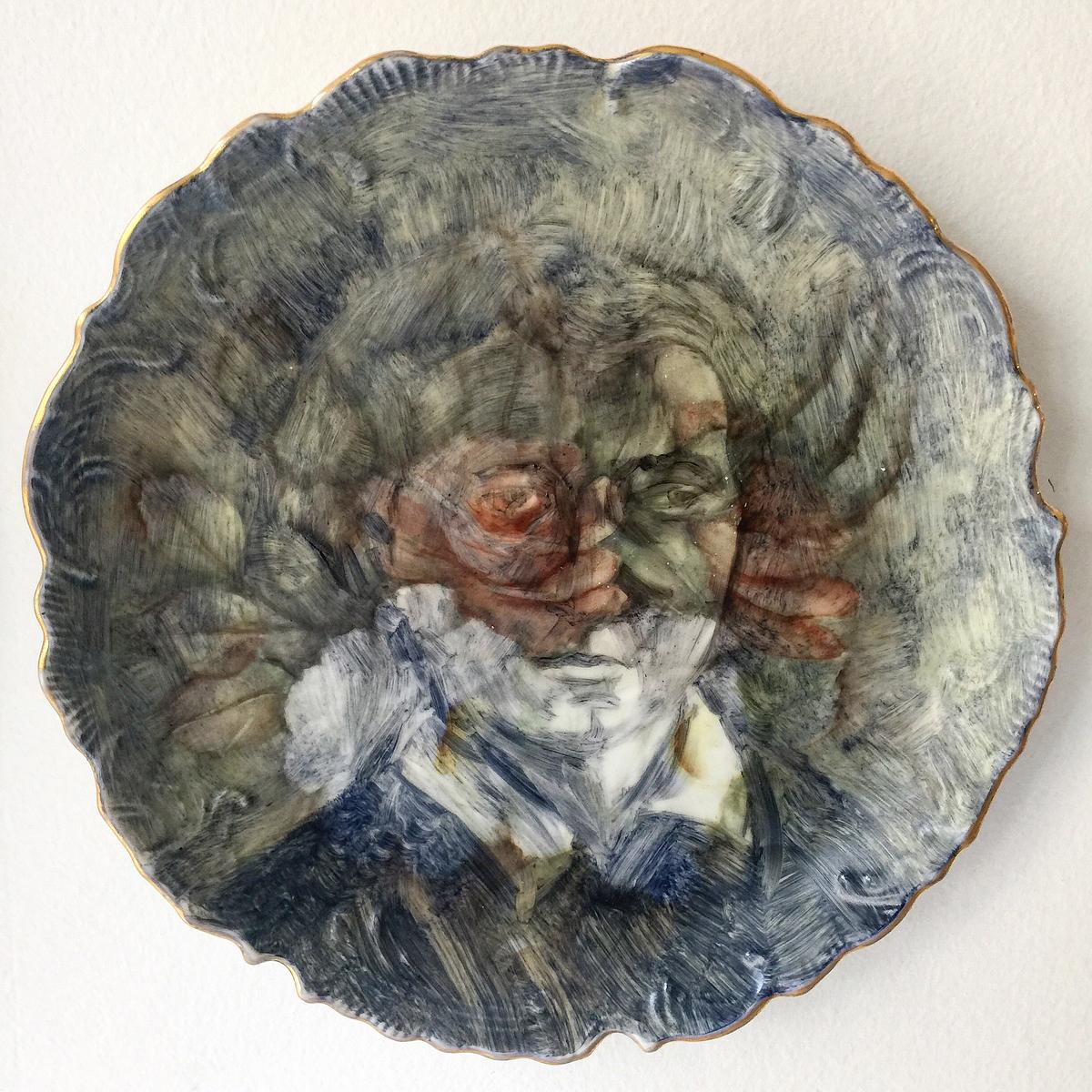 Onglaze portrait painting on a second hand ceramic plate based on a family photograph.