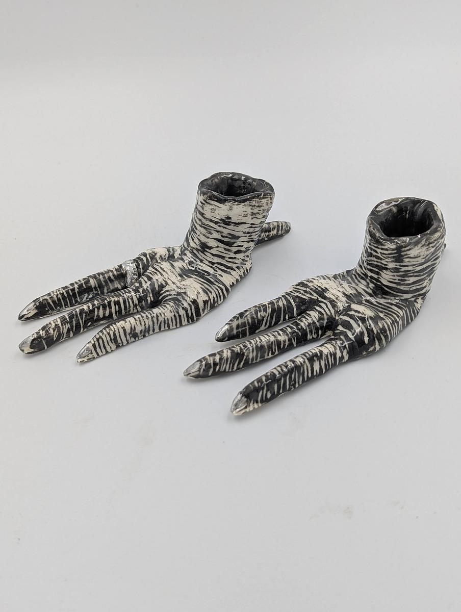 hand built with coloured slip sgraffito and cold paint.