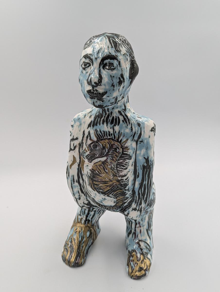 slip cast sgraffito and  hand painted with  cold paint